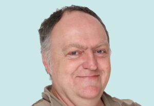 A portrait of Simon Jones, Digital Inclusion Advisor at Digital Communities Wales